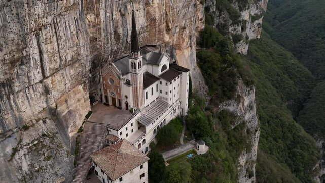 Sanctuary of Madonna della Corona: suspended between heaven and earth, where faith meets the majesty of nature. Italy 