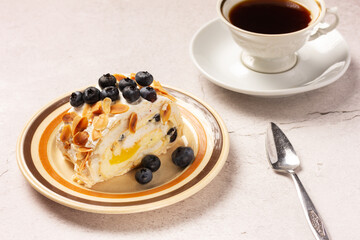 cup of coffee and cake on the plate