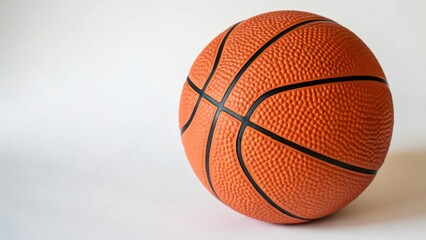 Fototapeta premium Orange Basketball on White Background
