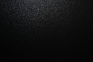 Dark Shimmering Texture with Subtle Sparkle on a Black Surface