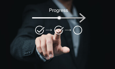 Businessman or manager touching on checklist to tick correct mark with progressive loading status...