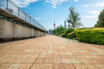 Walkway with Shanghai skyline view from park with modern buildings in Shanghai
