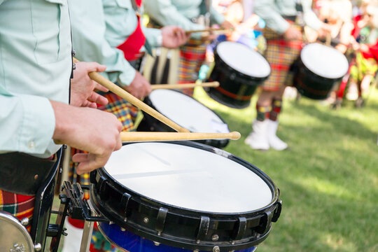 A group of drummers from a highland band perform