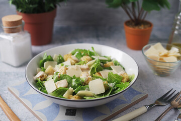 A bowl with classic Caesar salad