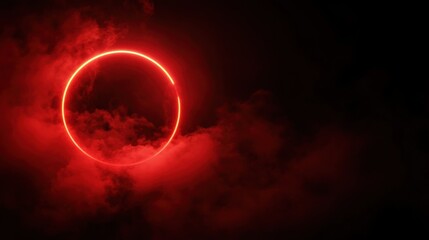 Red glowing circle in dark sky surrounded by swirling clouds creating a mysterious and dramatic atmosphere for artistic backgrounds and designs