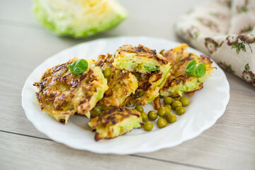 vegetable cabbage pancakes on a wooden table
