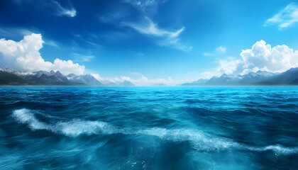 Obraz premium A stunning view of the ocean under a bright blue sky, with fluffy clouds reflecting the beauty of nature's tranquility.