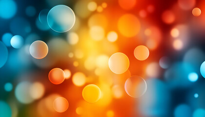 Obraz premium A vibrant background featuring colorful bokeh effects in blue, orange, and yellow shades, perfect for creative projects.