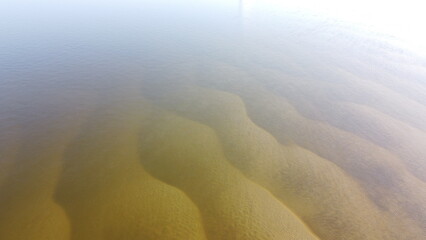 Sandy banks of the river and very low water level.