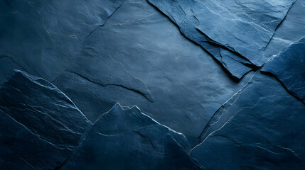 Close-up view of dark slate stone surfaces, highlighting texture and patterns for use in architecture or design projects.