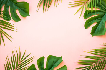 Summer flat lay background tropical leaves on white.