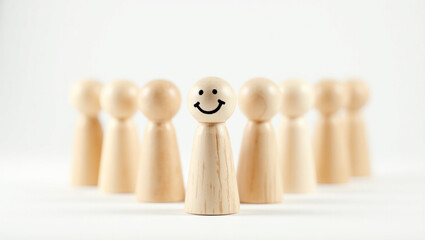 Happy pawn figure in a group of pawns.