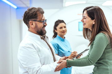 Cheerful Doctor Greeting a Patient in a Bright Modern Healthcare Environment