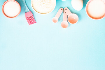 Fototapeta premium Food baking background at blue flat lay.