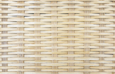 Close-up of a large bamboo basket surface used as a background.