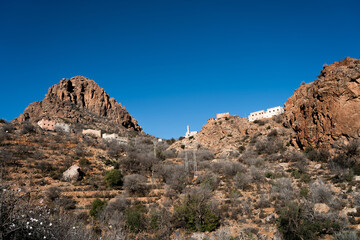 Fototapeta premium Traditional Berber House on a Rocky Hill in Tafraoute, Morocco – Remote Mountain Architecture
