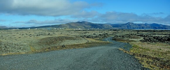 Iceland-panoramic view of road and seacoast near Grindavík on the southern peninsula
