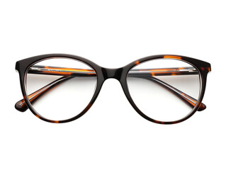 Tortoiseshell eyeglasses on black background.