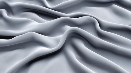 Fototapeta premium Soft gray fabric with elegant draping and textured pattern.