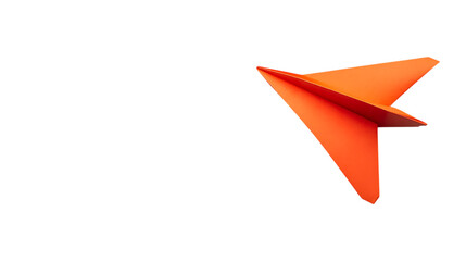 Orange paper airplane on black background