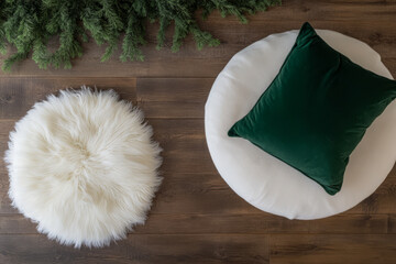 Cozy seating arrangement with plush pillows and faux fur accents for a warm atmosphere