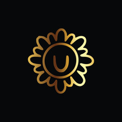 Golden letter U monogram in floral badge style in black background luxury emblem design