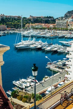 Amazing landscape with port Hercule  and residential buildings and mount .