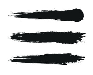 Abstract black grunge strokes on a white background for design, texture, or overlay.