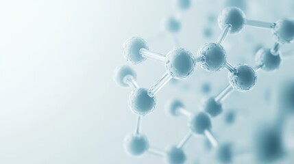 Transparent glass molecular structure model on soft blue background with copy space for scientific or medical concept