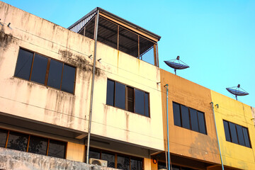 the old building with sky background with satellite dishes
