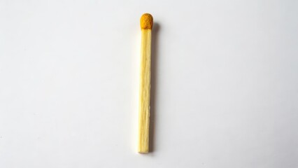 Single Matchstick on White Background