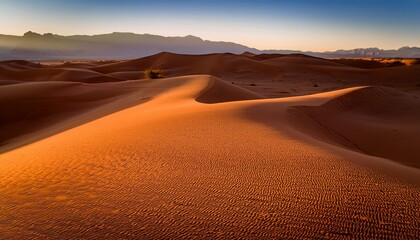 a visual depiction of captivating interaction between light and shadow on sandy desert capturing ever changing textures and colors