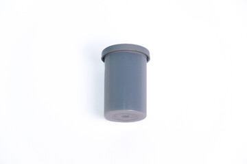 plastic can for negative film isolated on white background