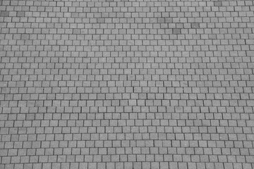 Facing gray tiles as grey modern background. paving decorative stone tiles top view. tiles for...