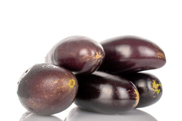 Several ripe dark blue eggplants, close-up, isolated on white.