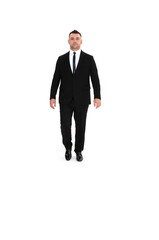 A handsome dark-haired man wearing a business suit, a white shirt on a white background