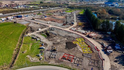 Aerial view of housing foundations being built on a building site and housing estate
