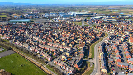 Aerial view of housing foundations being built on a building site and housing estate