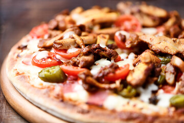 Gyros Pizza with jalapeno pepper and mozzarella cheese. Soft focus. Close up.