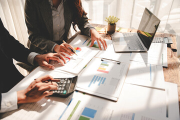 Young colleagues discussing financial business and analysis Teamwork concept in modern office...