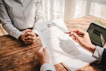 Portrait of a person interviewing for a job and.Submit resume to staff job application concept