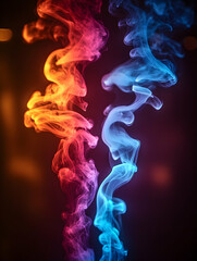 Fototapeta premium Colorful smoke swirls in dark studio (1)