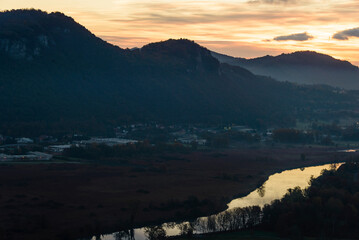 top view of the Adda river during an autumnal morning, Lecco province, Italy