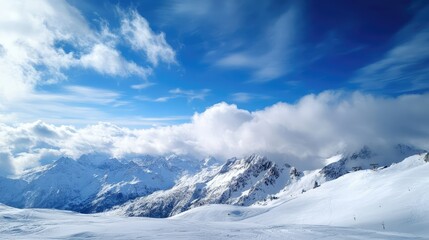 Majestic Snow-Covered Mountains Under a Bright Blue Sky with Fluffy Clouds and a Scenic Winter Landscape Ideal for Nature and Adventure Themes