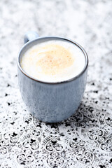 Cappuccino on bright background. Soft focus. Copy space. 