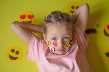 A confused, confused, awkward girl with a variety of icons and emoticons on cheeks. The concept of...