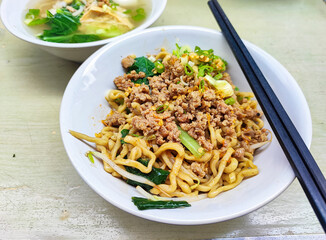 Bangka noodles with chicken and tofu kok soup