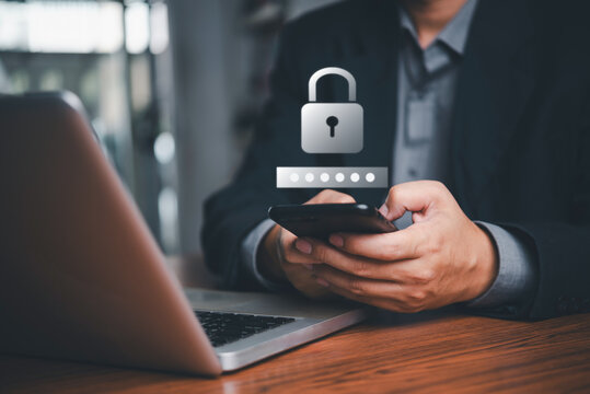 Hands holding a smartphone with a password input field and security lock icon, symbolizing data protection and internet cybersecurity protect computer.