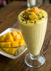 Photogenic mango milkshake with perfect styling and fresh ingredients 