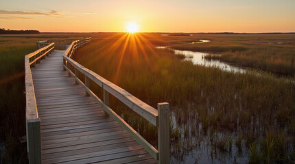 Beautiful wooden bridge at sunset near a lake
